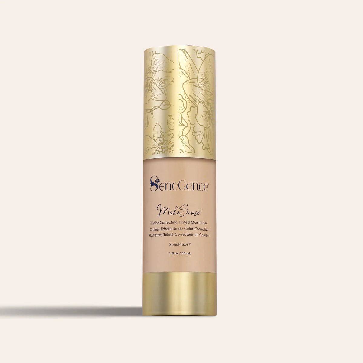 MakeSense Color Correcting Tinted Moisturizer in a beige bottle with a decorative gold floral cap