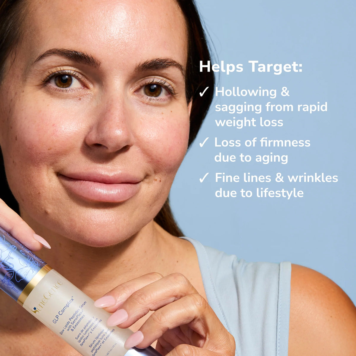 Close-up of a smiling woman holding GLP Complex serum bottle against a pale blue background.
