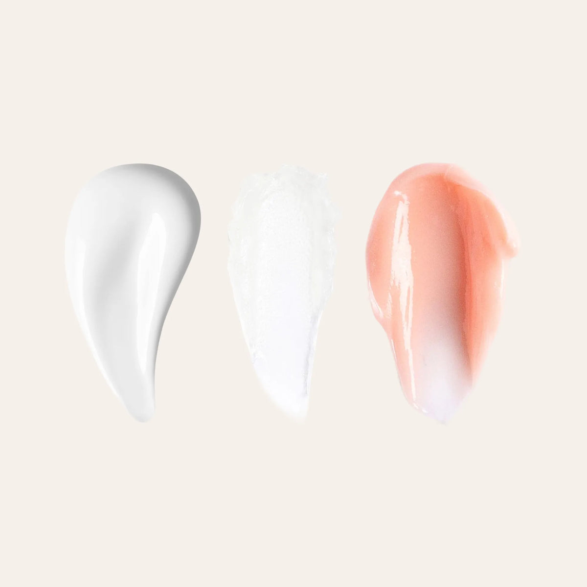 Three lip care swatches on a beige background white cream white balm and peach tinted cream